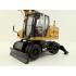 Diecast Masters 85956 - Caterpillar CAT M318 Wheeled Excavator & Attachments High Line - Scale 1:50