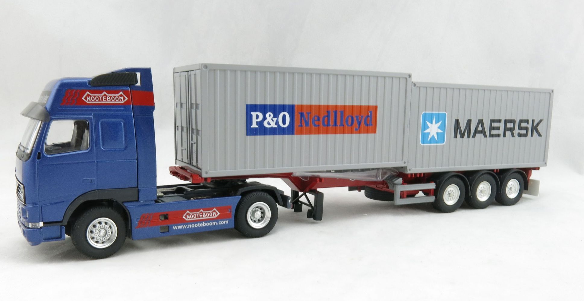 Product Image - Conrad 46124/01 VOLVO FH16 4x2 truck with 3-axle Nooteboom Container Flexitrailer Scale 1:50