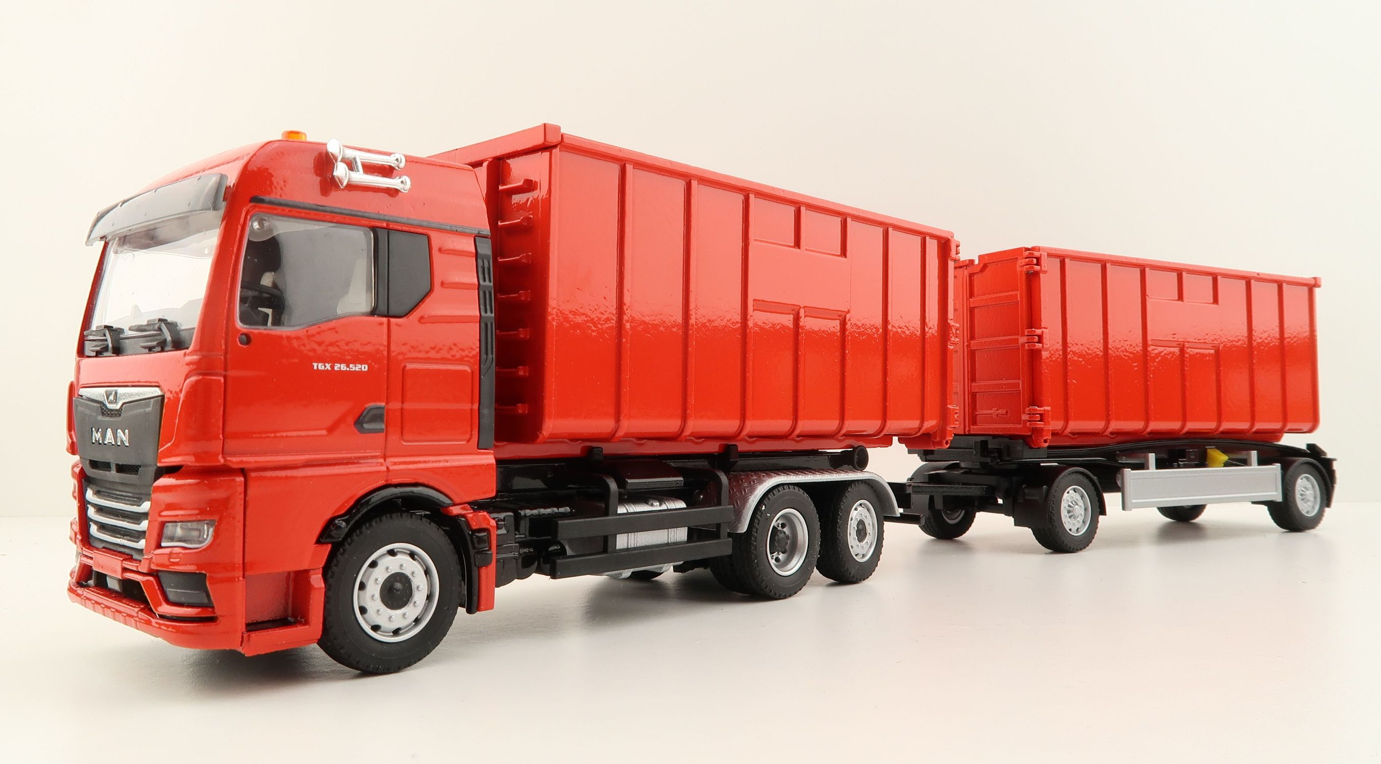 Product Image - Conrad SET10019 - MAN TGX GM Hook Lift Container Truck with Trailer - Scale 1:50