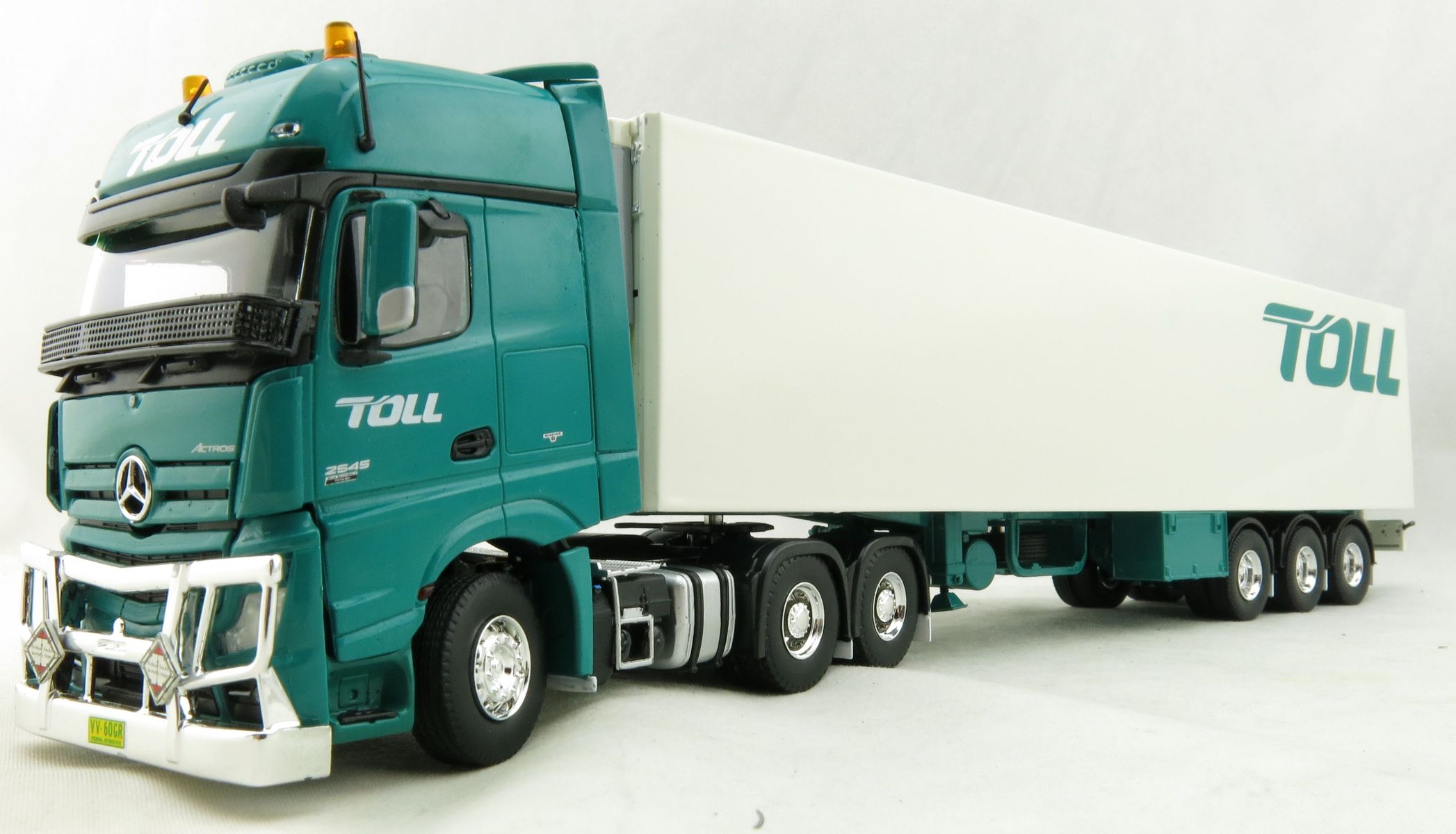 Product Image - Road Ragers 75408 - Australian Toll Mercedes Actros 6x4 Prime Mover with Refrigerated Trailer Toll - Scale 1:50